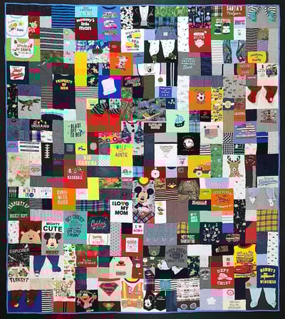 Baby clothes quilt with pj feet by Too Cool T-shirt Quilts